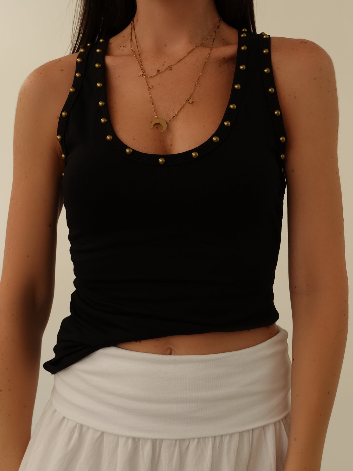 CANOTTA CON BORCHIE - NERO 97558